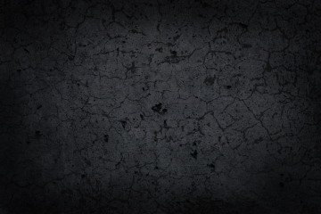 Dark background, black wall with cracks