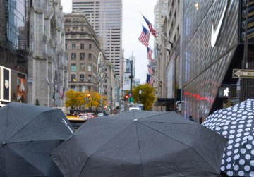 New York in Rainy Time, passersby with umbrellas