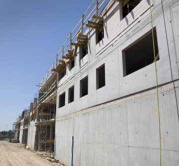 Climbing of the Concrete Walls of the Building
