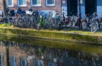 Parked bicycles in Amsterdam stock photo