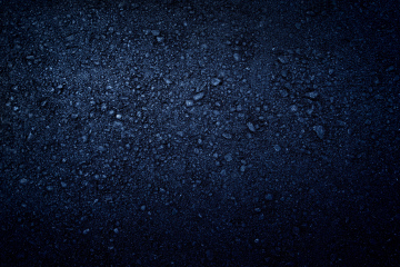 Dark Background With Pressed Stones