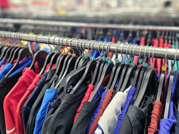 Clothing store with clothes on hangers