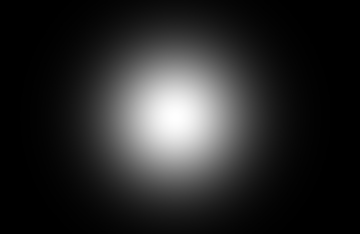 Black background and bright light in the center