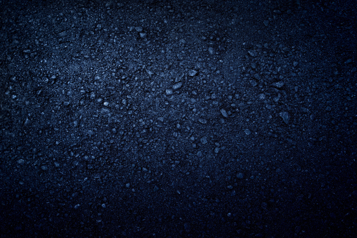 Dark Background With Pressed Stones